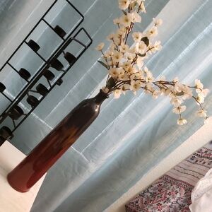 Elegant Brown Vase with White Floral Accents